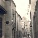 15. Carrer de Joaquim de Paz a la cruïlla amb el carrer del Passeig. Al fons el Teatre Principal. Any 1935. Autor desconegut. Reg. 33817